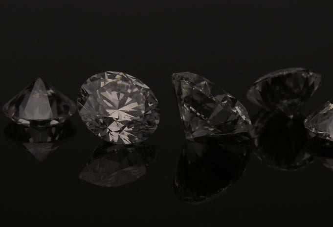 1 carat Round Diamonds On Dark Background