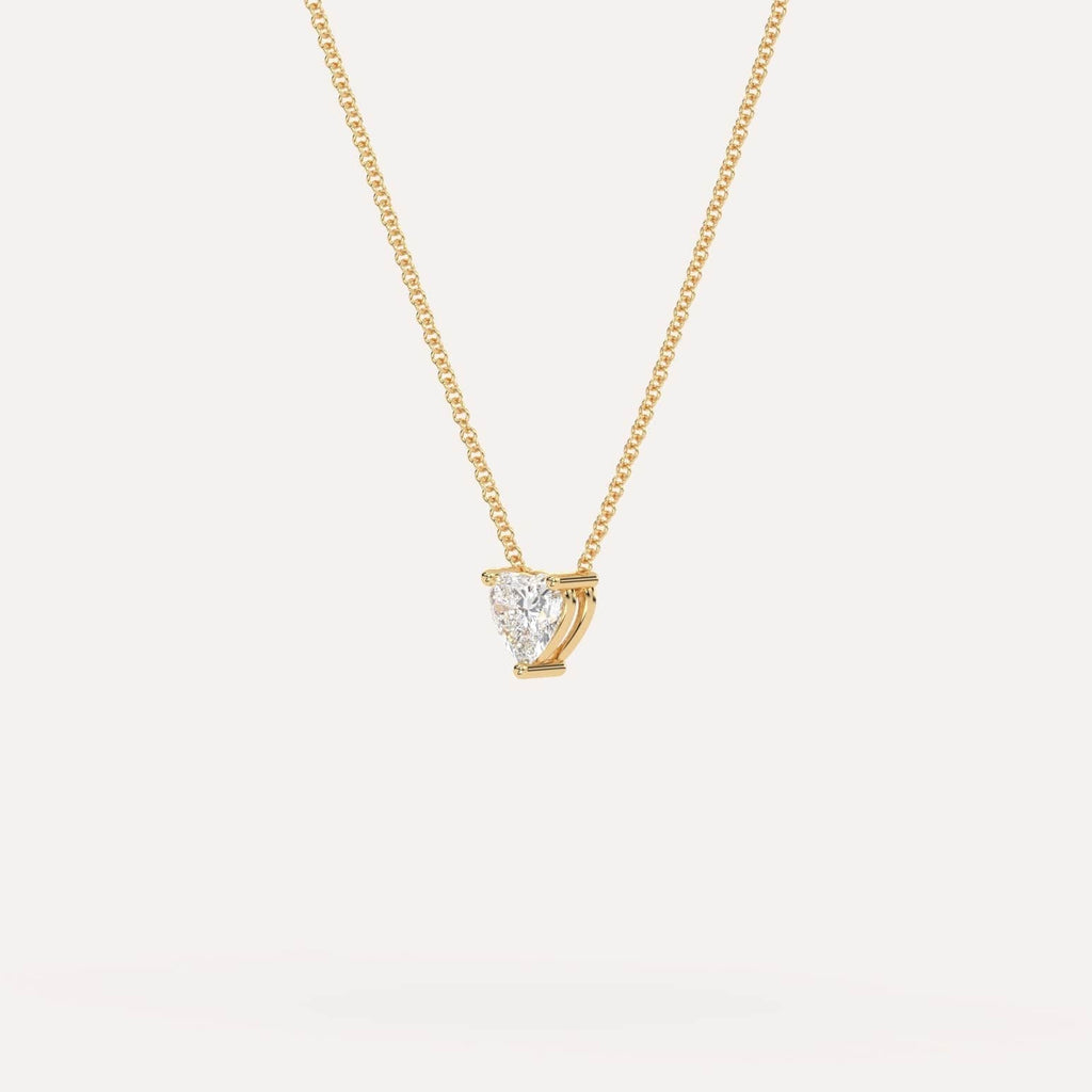 Yellow Gold Floating Diamond Necklace With 1/2 Carat Heart Diamond