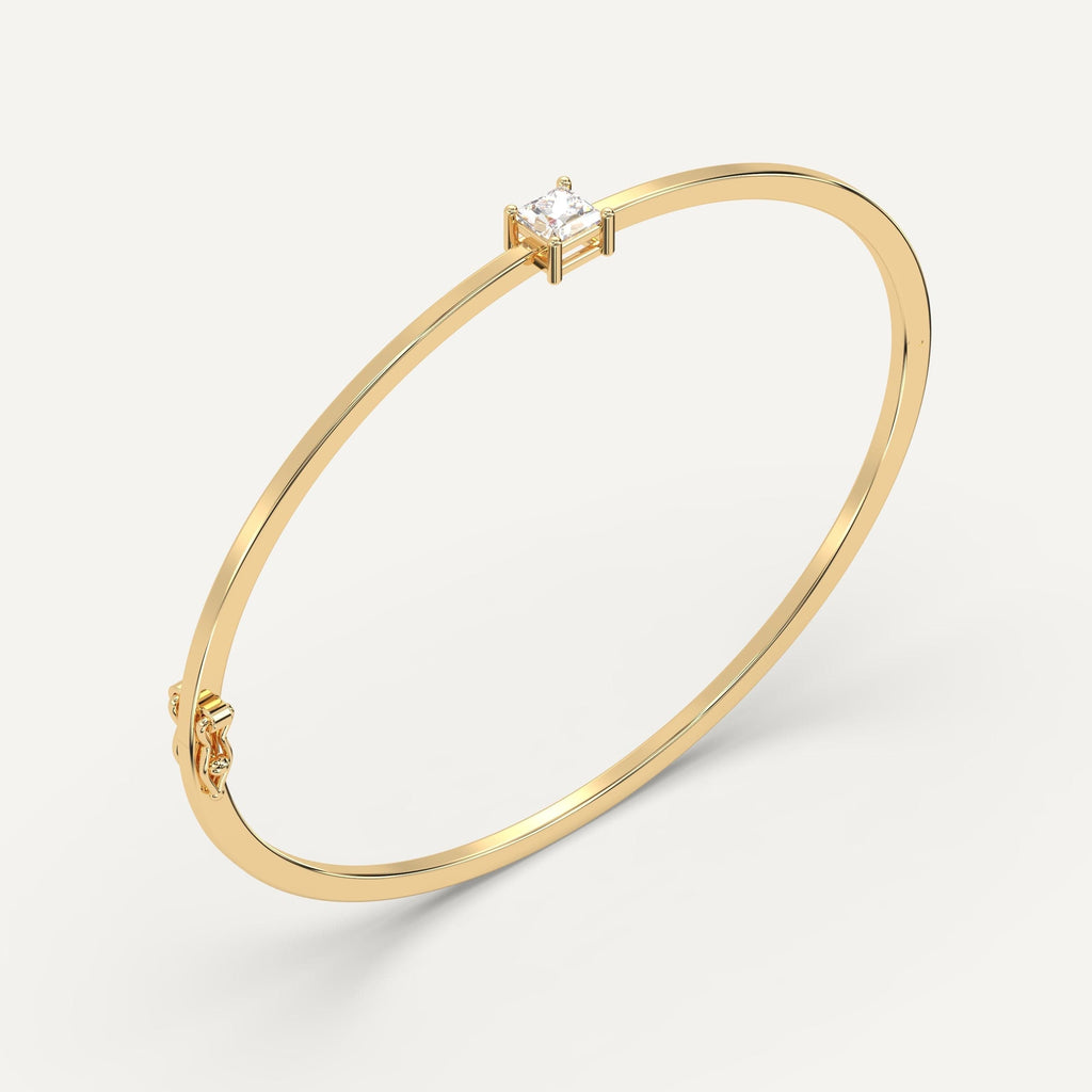 yellow gold solitaire, bangle bracelets with 1/2 carat princess diamonds