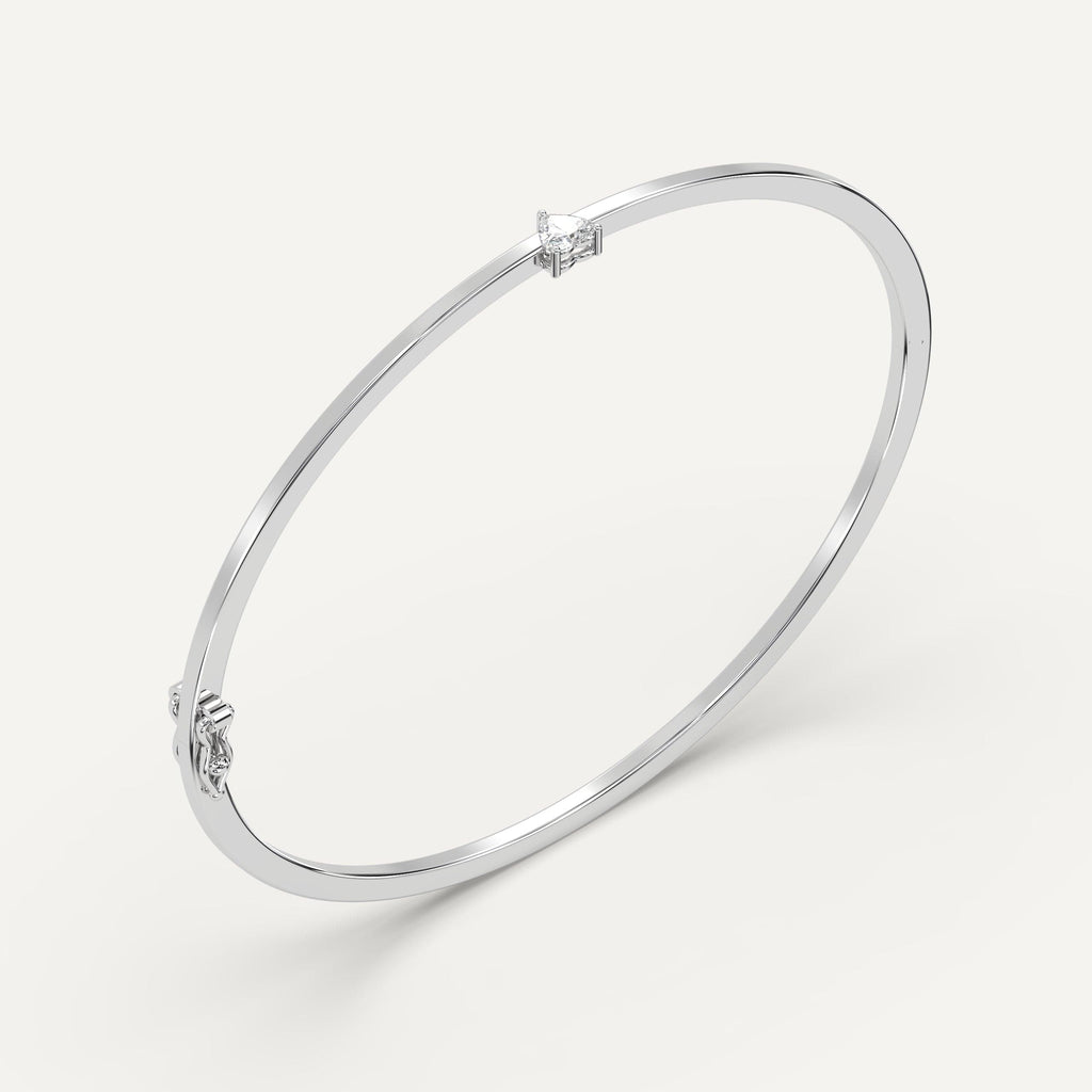 white gold solitaire, bangle bracelets with 1/4 carat heart diamonds