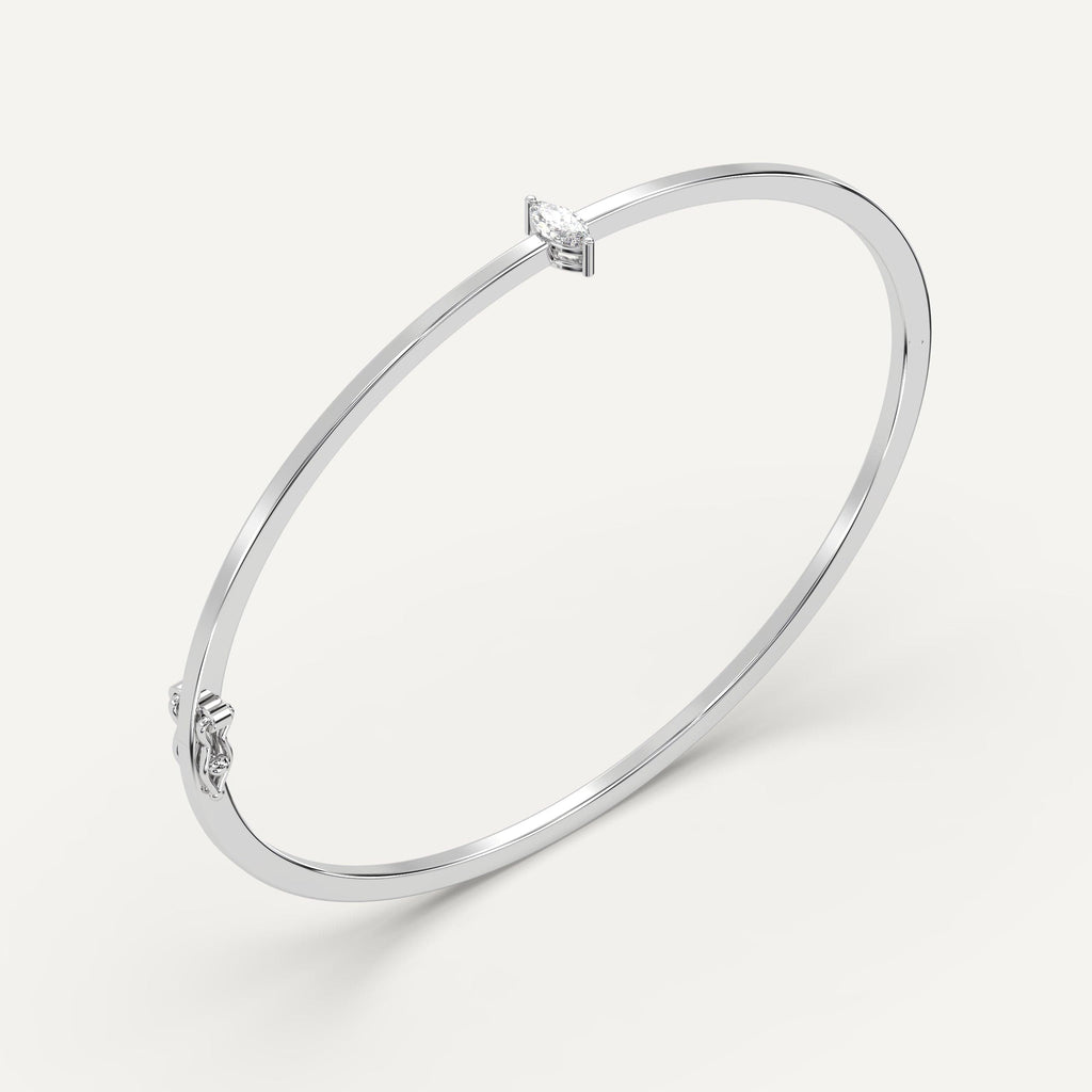 white gold solitaire, bangle bracelets with 1/4 carat marquise diamonds