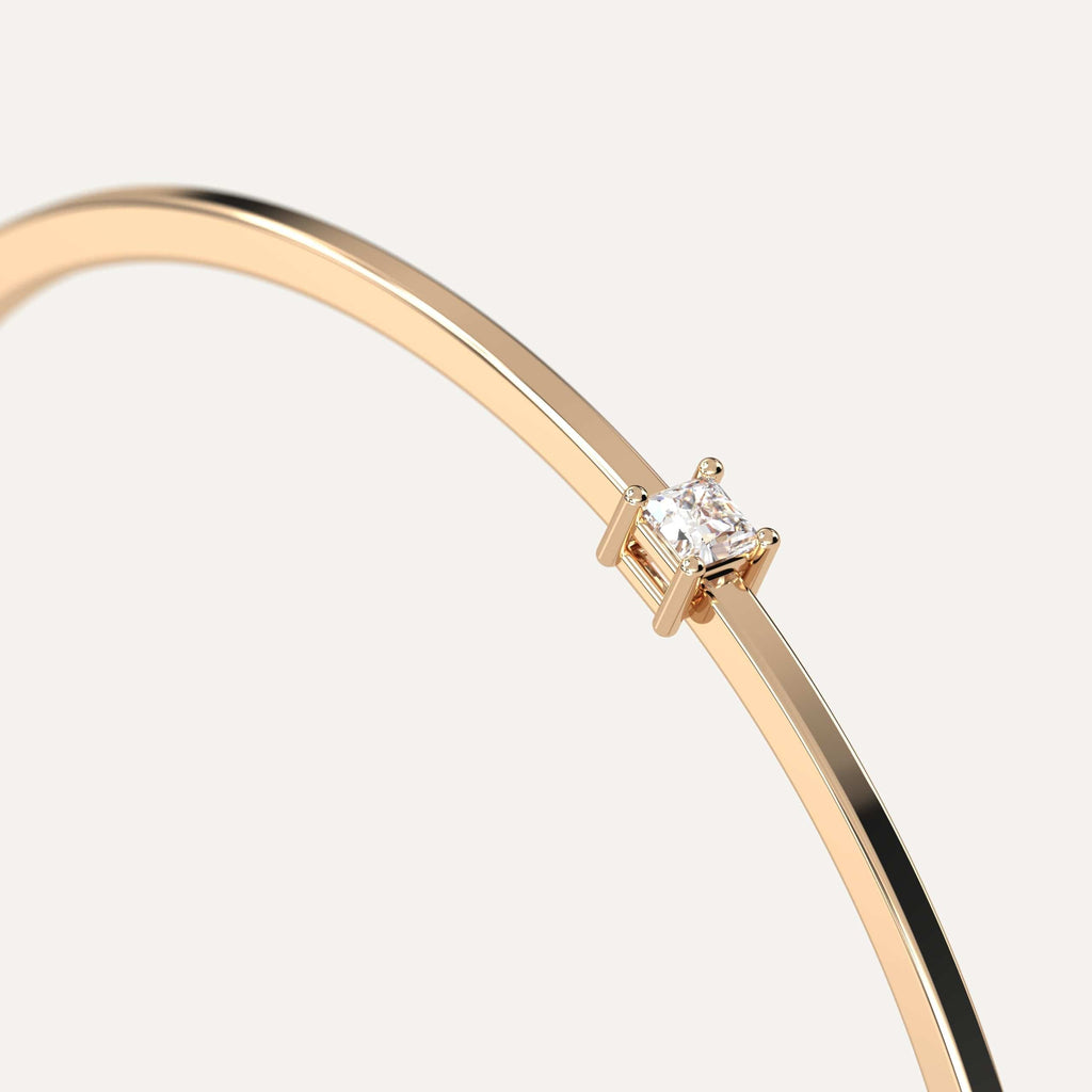 classic diamond solitaire, bangle bracelet with princess natural diamonds in yellow gold