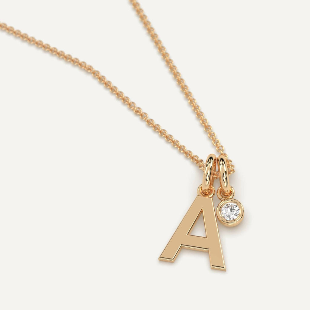 Yellow gold initial A necklace with diamond