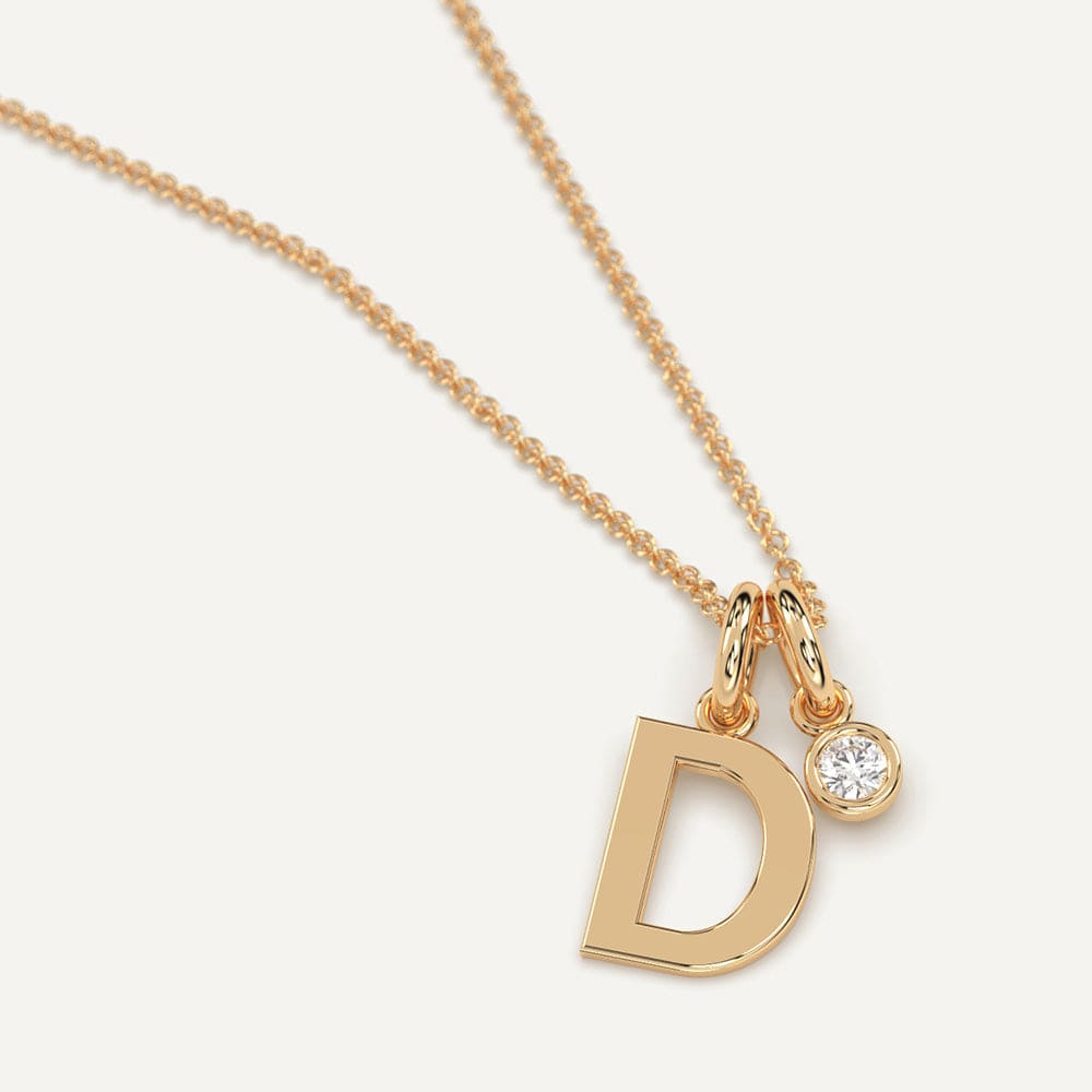 Yellow gold diamond D letter necklace