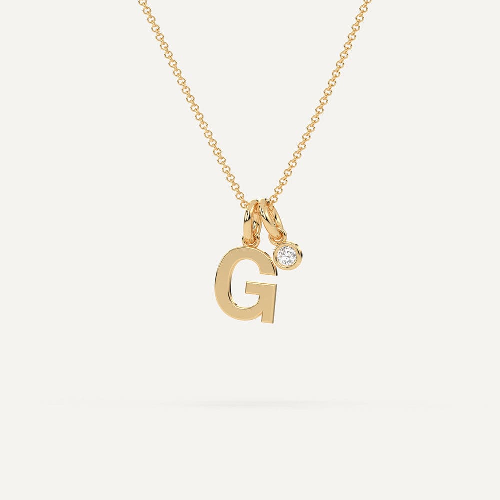 Yellow gold G letter pendant