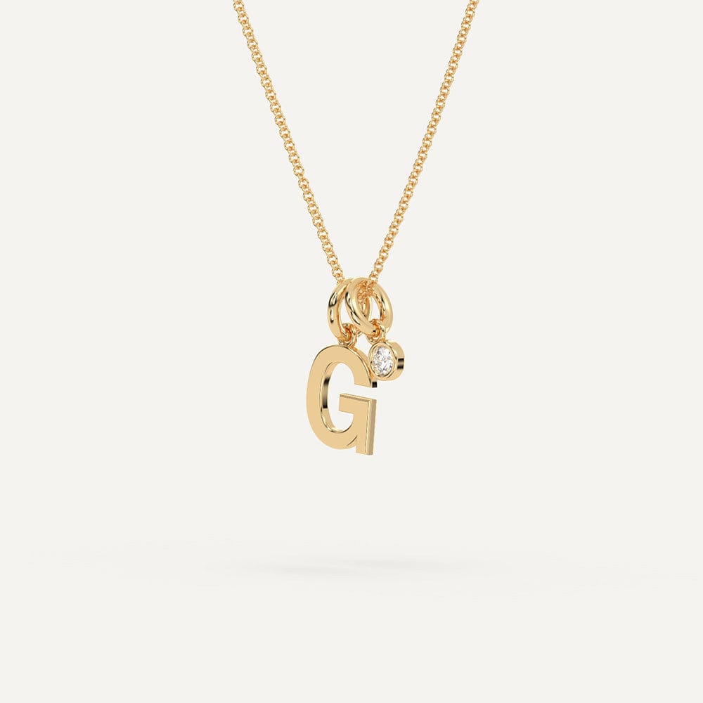 Gold G initial pendant necklace