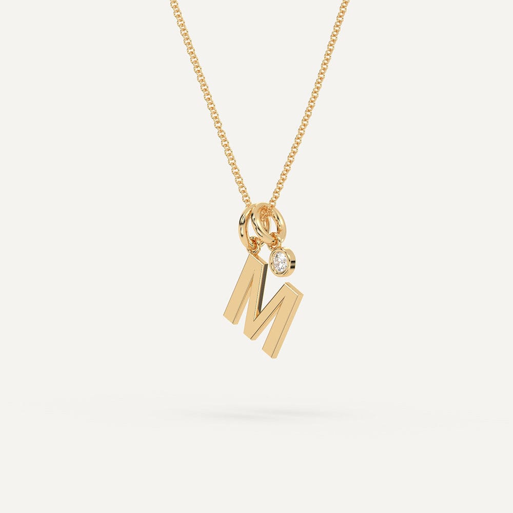 Gold M initial pendant necklace