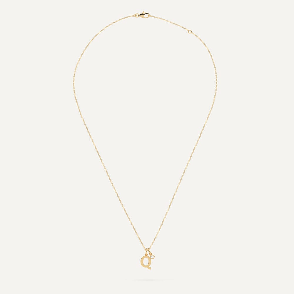 Gold necklace with letter Q