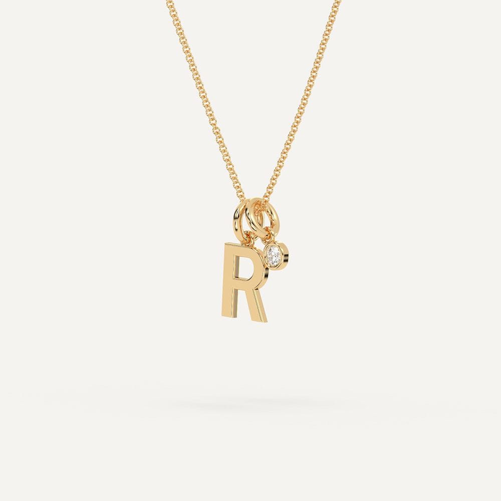 Gold R initial pendant necklace