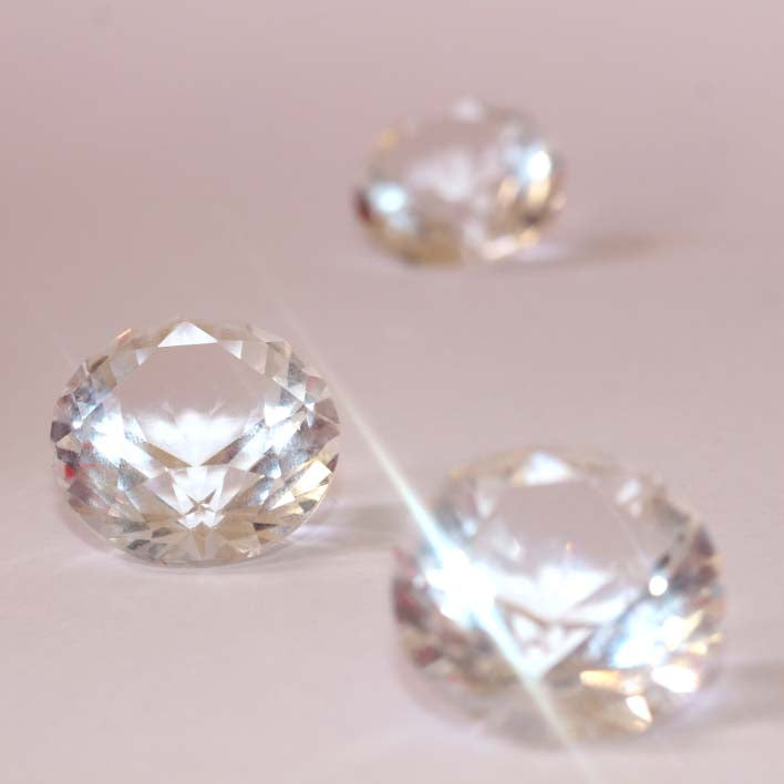 Close up of large round moissanite gemstones