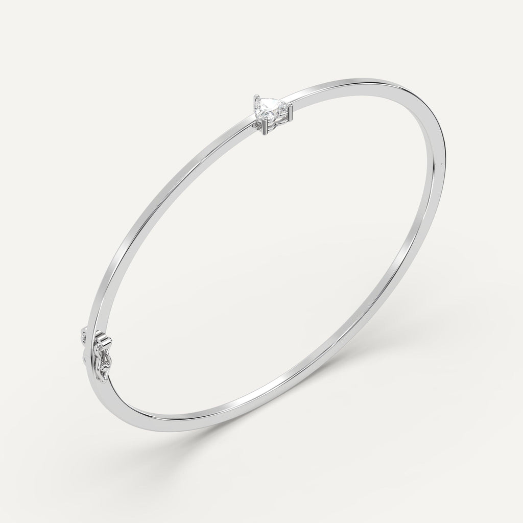 white gold solitaire, bangle bracelets with 1/2 carat heart diamonds