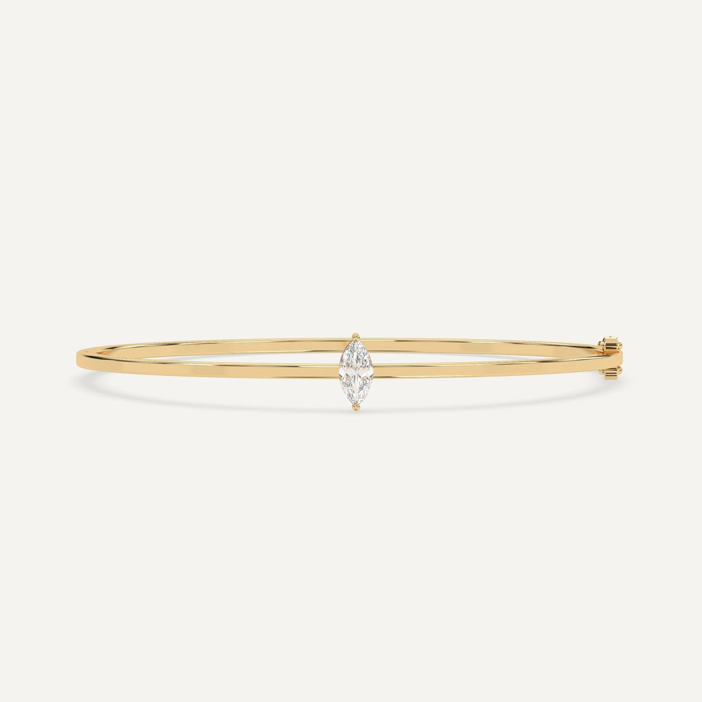 1/2 carat diamond solitaire, bangle bracelet in 14K yellow gold