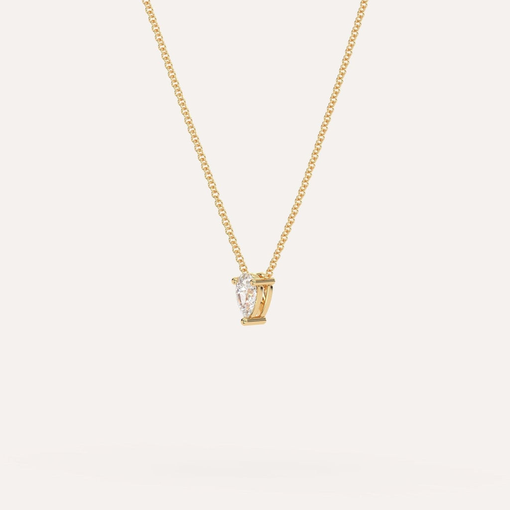 Yellow Gold Floating Diamond Necklace With 1/2 Carat Pear Diamond