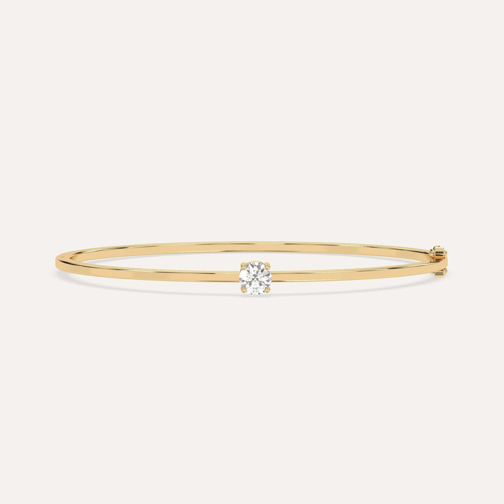 1/2 carat diamond solitaire, bangle bracelet in 14K yellow gold