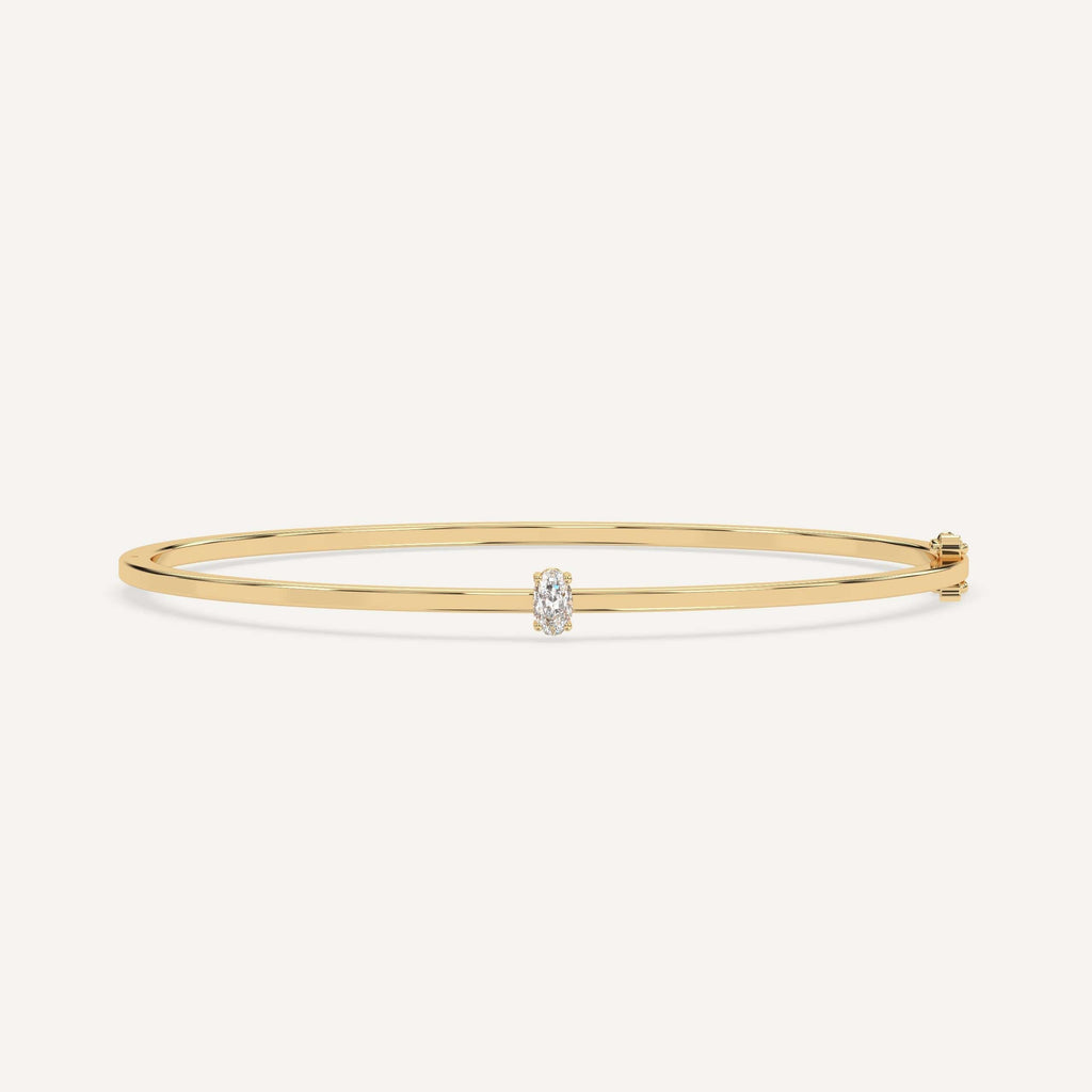 1/4 carat diamond solitaire, bangle bracelet in 14K yellow gold