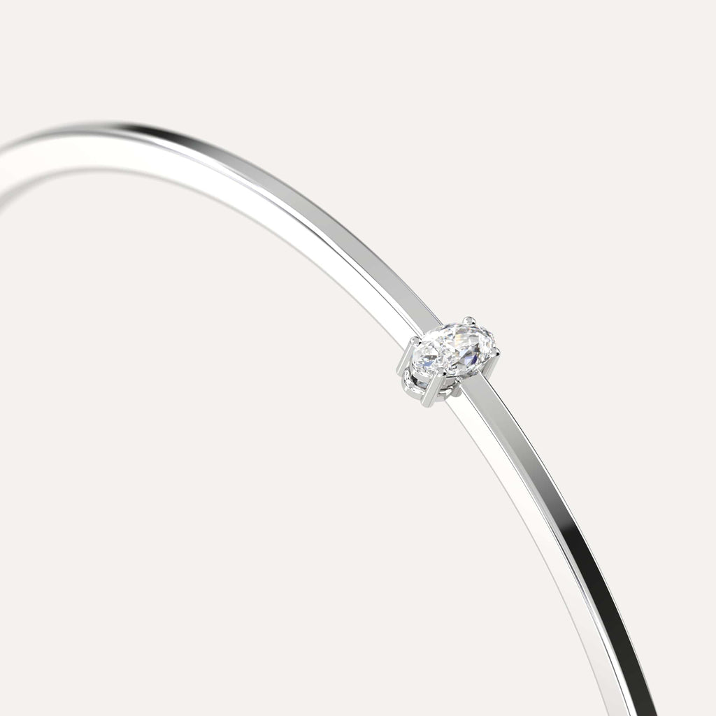 classic diamond solitaire, bangle bracelet with oval lab diamonds in white gold