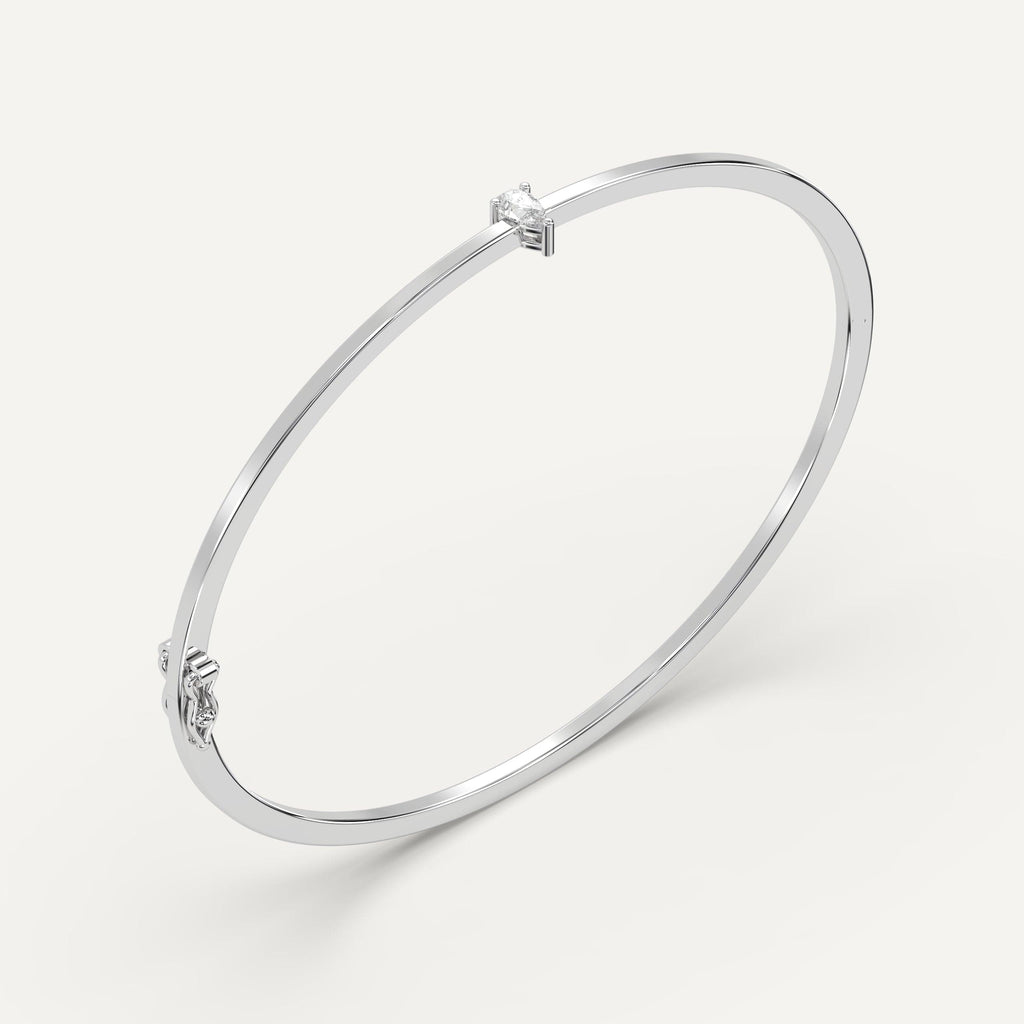 white gold solitaire, bangle bracelets with 1/4 carat pear diamonds
