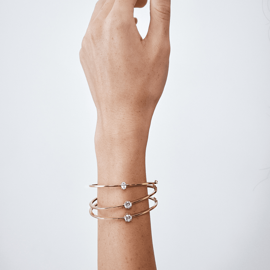 Single Diamond Bangle Bracelets on Woman Model Wrist Arm