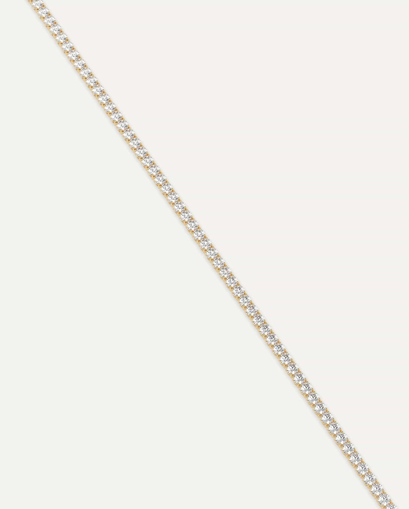 classic diamond tennis bracelet with round lab diamonds in yellow gold