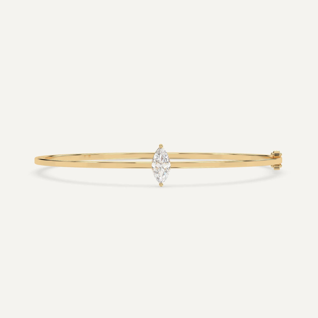 1 carat diamond solitaire, bangle bracelet in 14K yellow gold