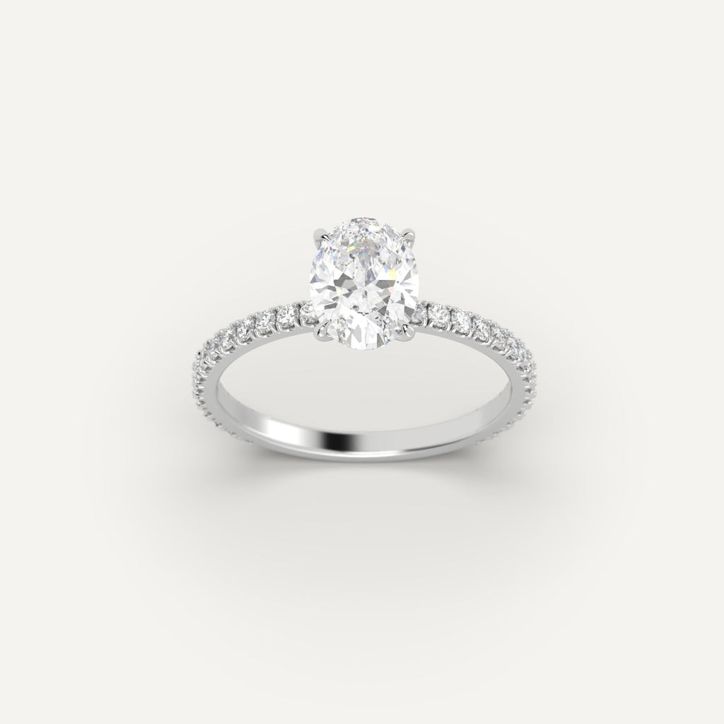 White Gold 1 Carat Engagement Ring On Woman's Hand