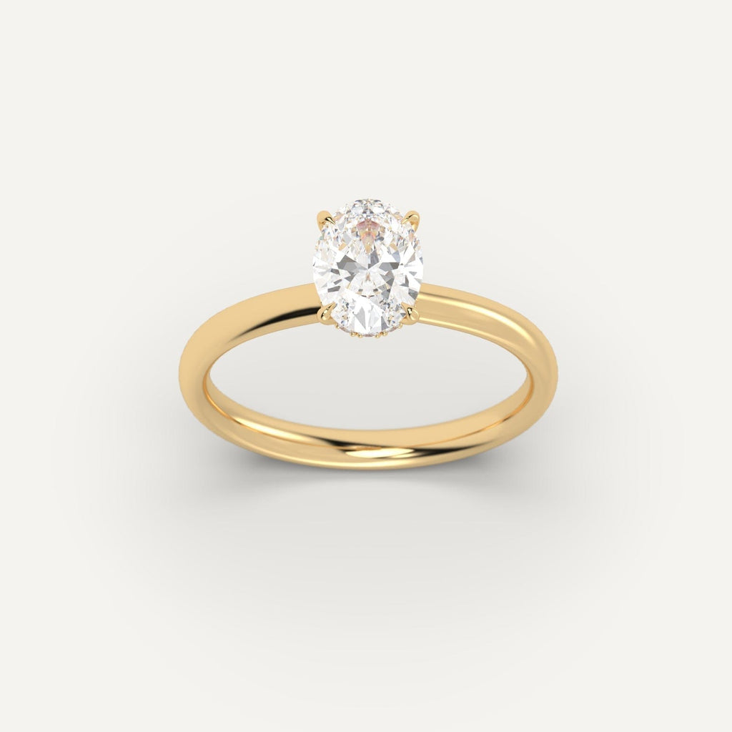 Yellow Gold 1 Carat Engagement Ring On Woman's Hand