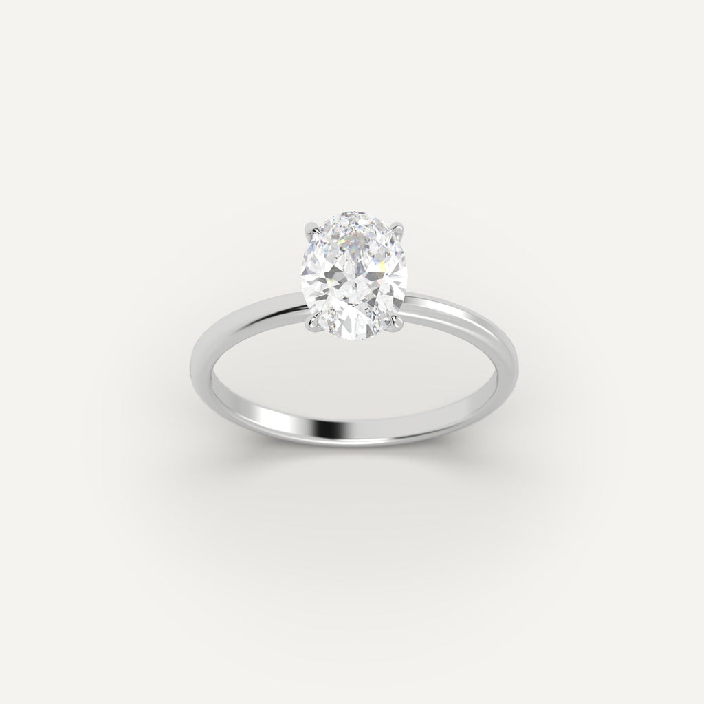 White Gold 1 Carat Engagement Ring On Woman's Hand