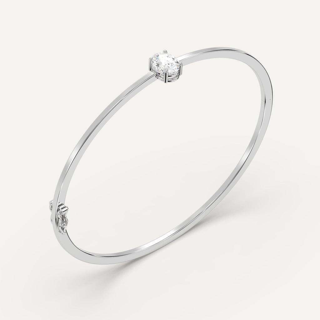 white gold solitaire, bangle bracelets with 1 carat oval diamonds