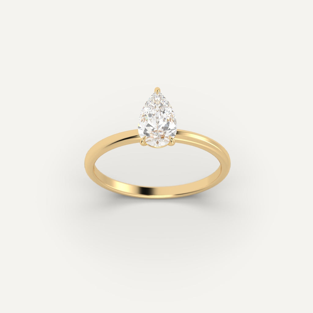 Yellow Gold 1 Carat Engagement Ring On Woman's Hand