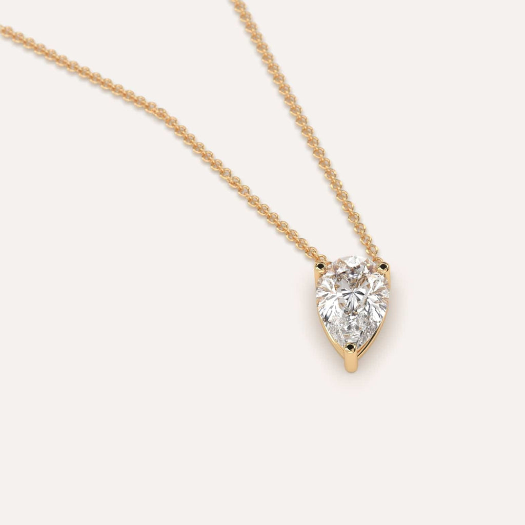 Simple Diamond Floating Necklace With Pear Natural Diamond In Yellow Gold