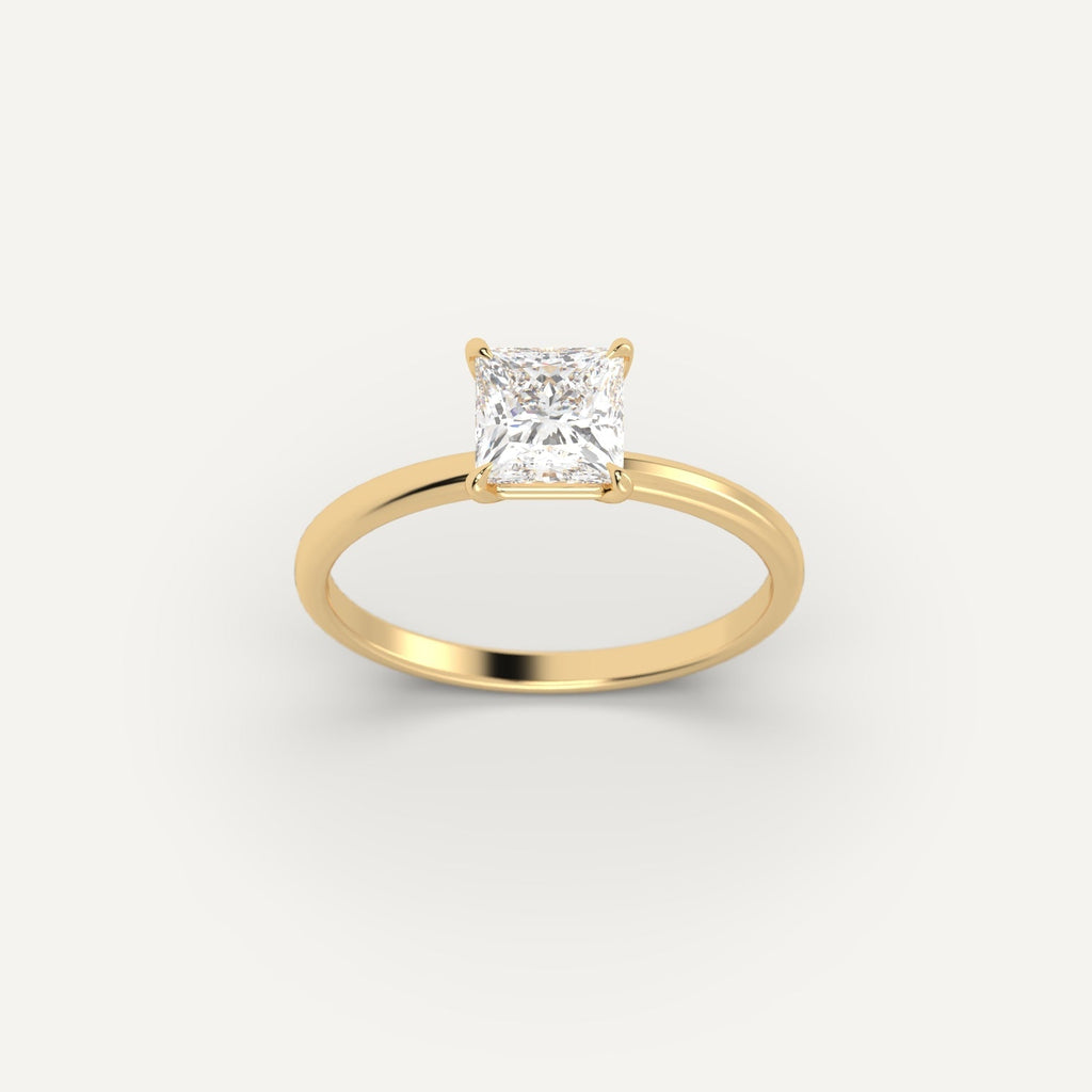 Yellow Gold 1 Carat Engagement Ring On Woman's Hand