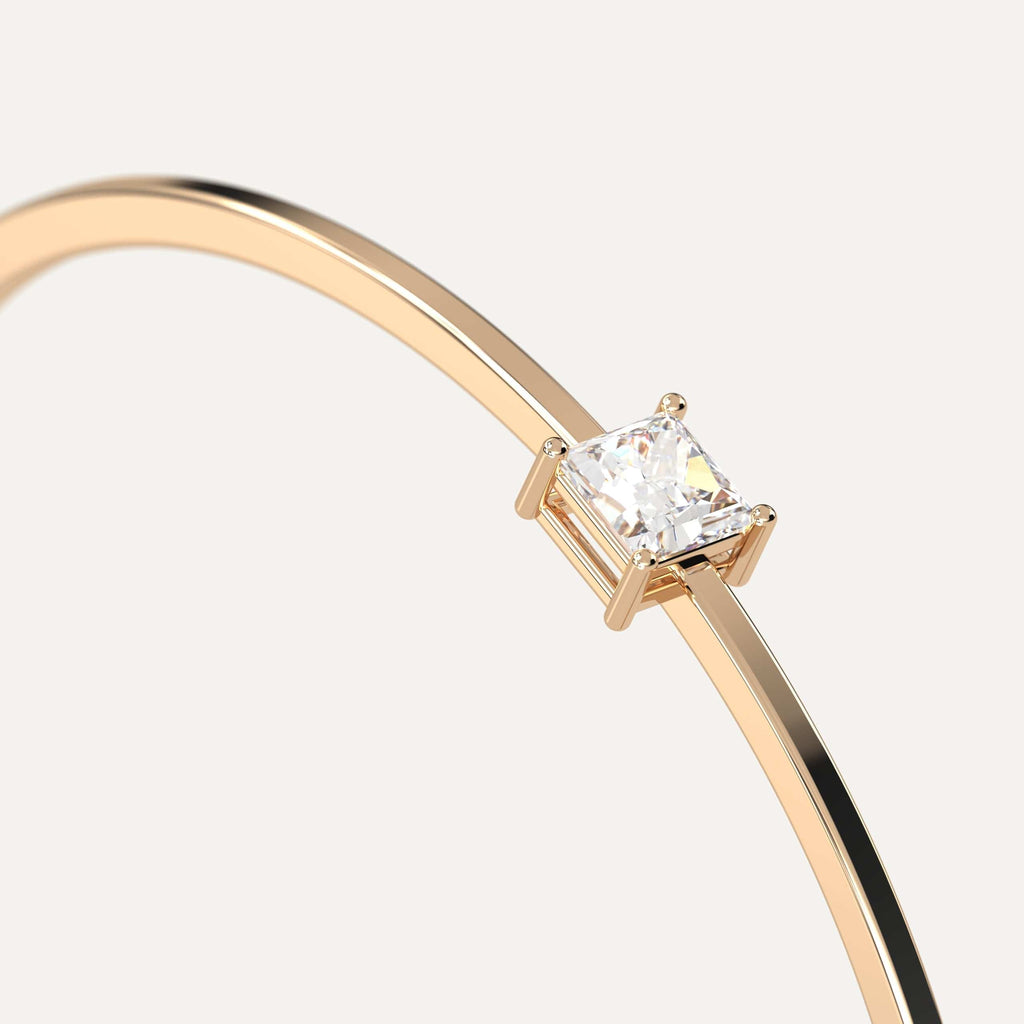 classic diamond solitaire, bangle bracelet with princess natural diamonds in yellow gold