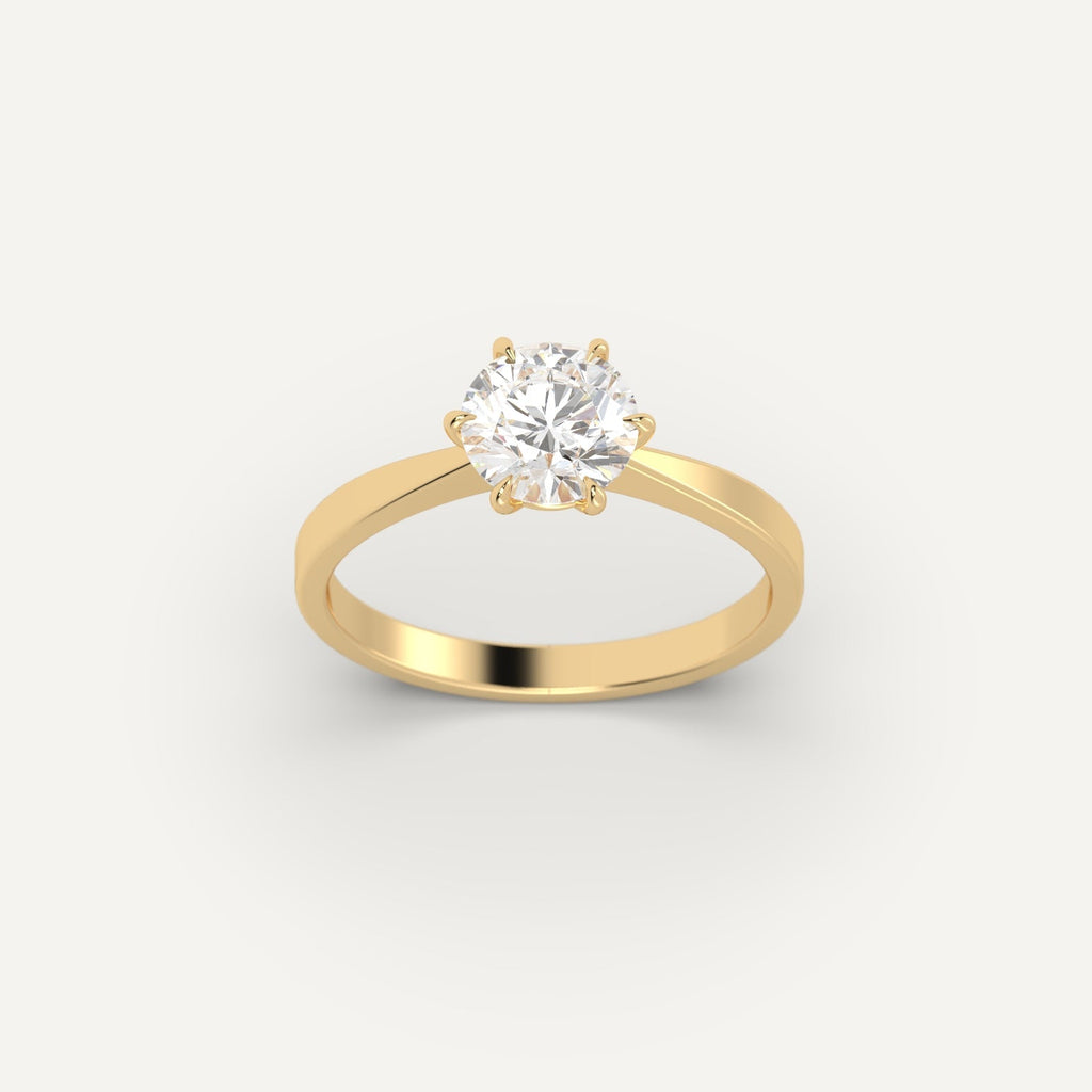 Yellow Gold 1 Carat Engagement Ring On Woman's Hand