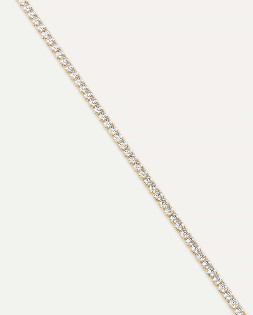 classic diamond tennis bracelet with round natural diamonds in yellow gold