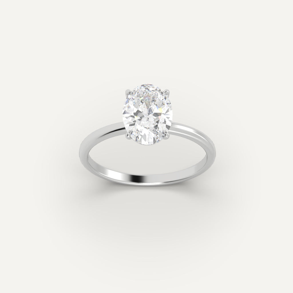 White Gold 2 Carat Engagement Ring On Woman's Hand