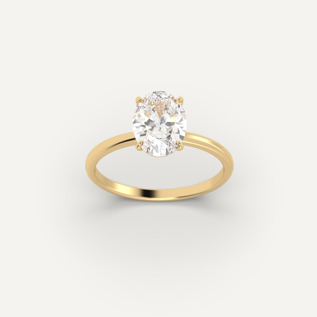 Yellow Gold 2 Carat Engagement Ring On Woman's Hand