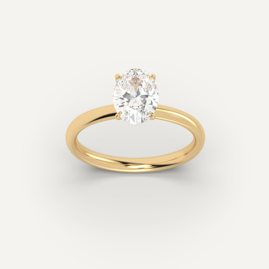 Yellow Gold 2 Carat Engagement Ring On Woman's Hand