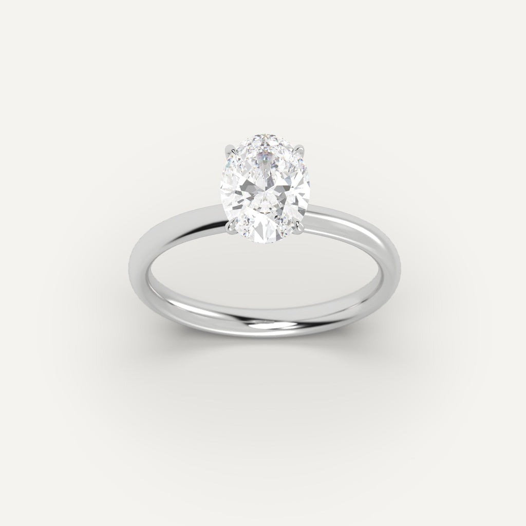 White Gold 2 Carat Engagement Ring On Woman's Hand