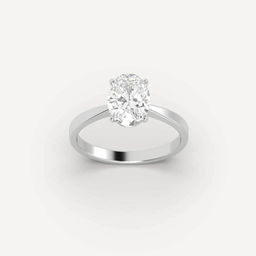 White Gold 2 Carat Engagement Ring On Woman's Hand