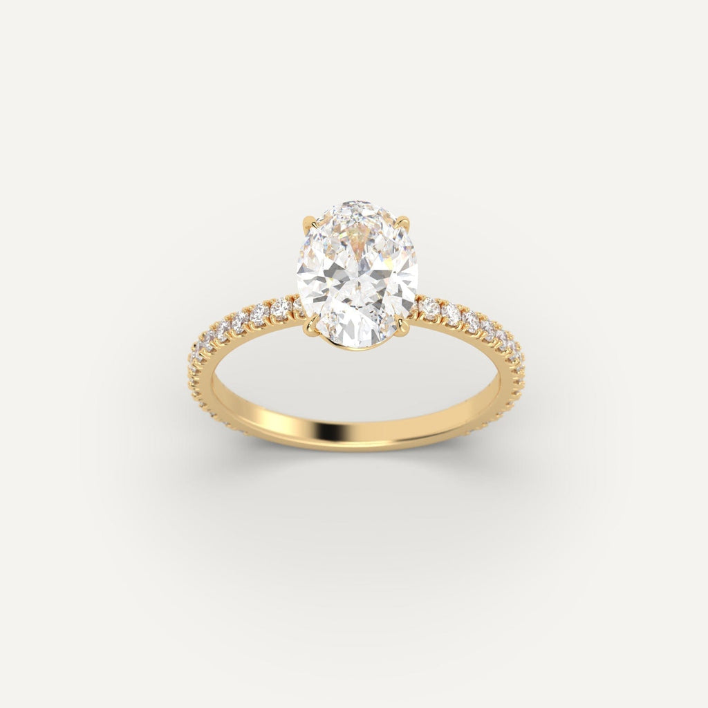 Yellow Gold 2 Carat Engagement Ring On Woman's Hand