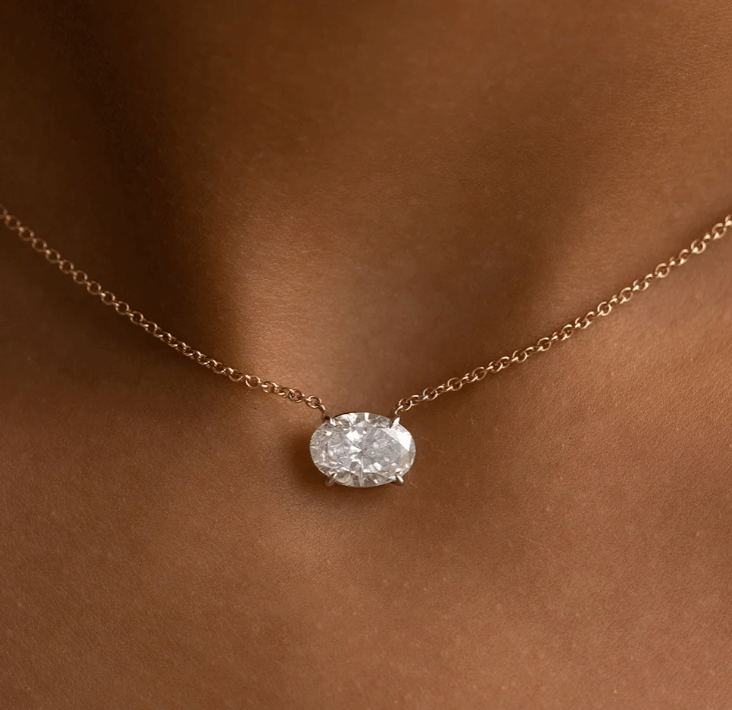 2 carat oval diamond necklace floating horizontal east to west