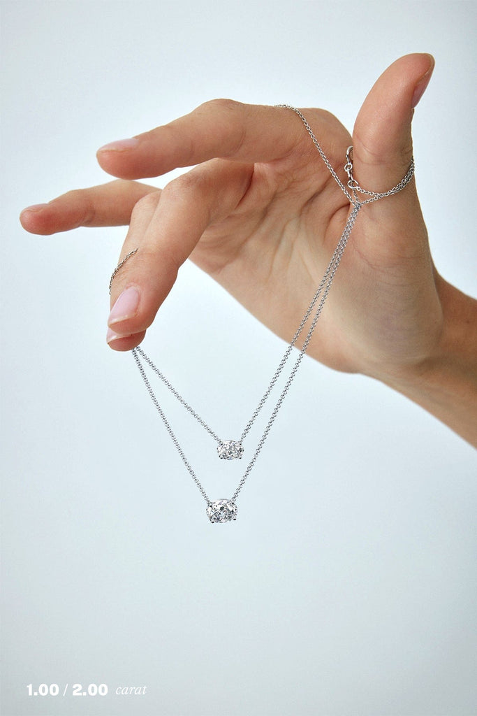 Oval Floating Diamond Necklace on Model in 14K White Gold