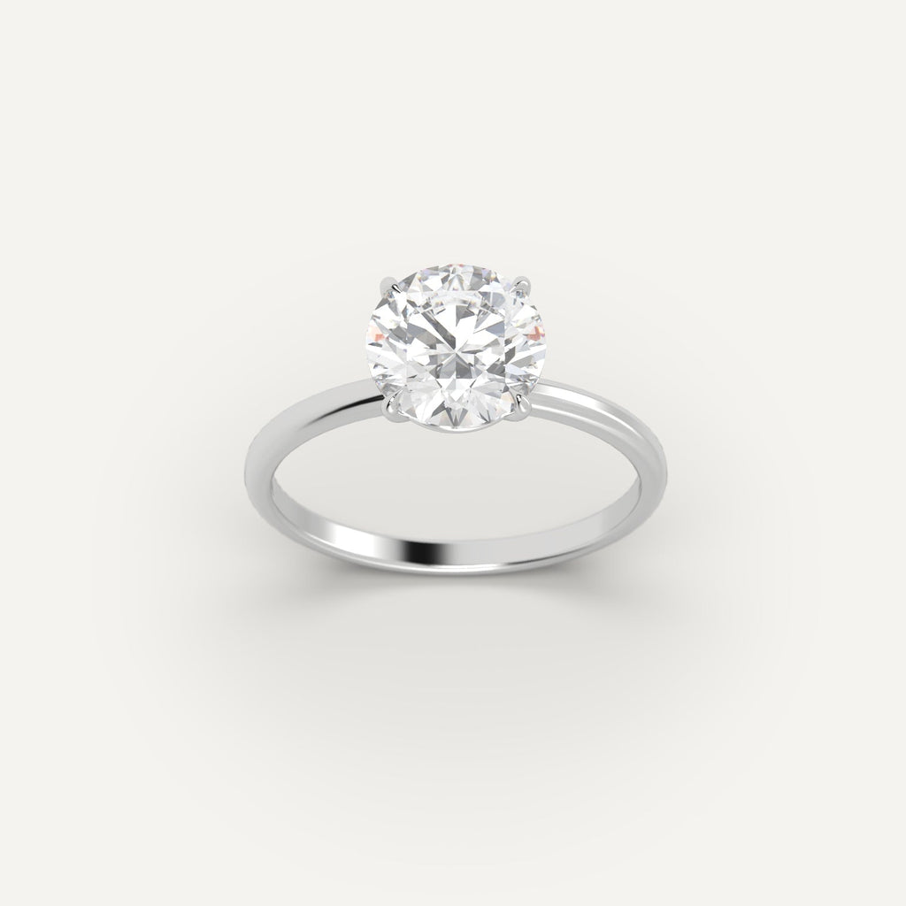 White Gold 2 Carat Engagement Ring On Woman's Hand