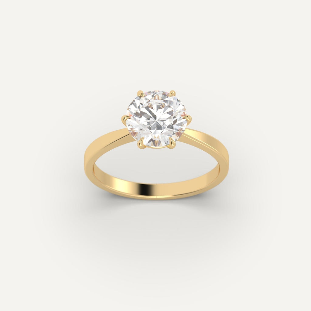 Yellow Gold 2 Carat Engagement Ring On Woman's Hand