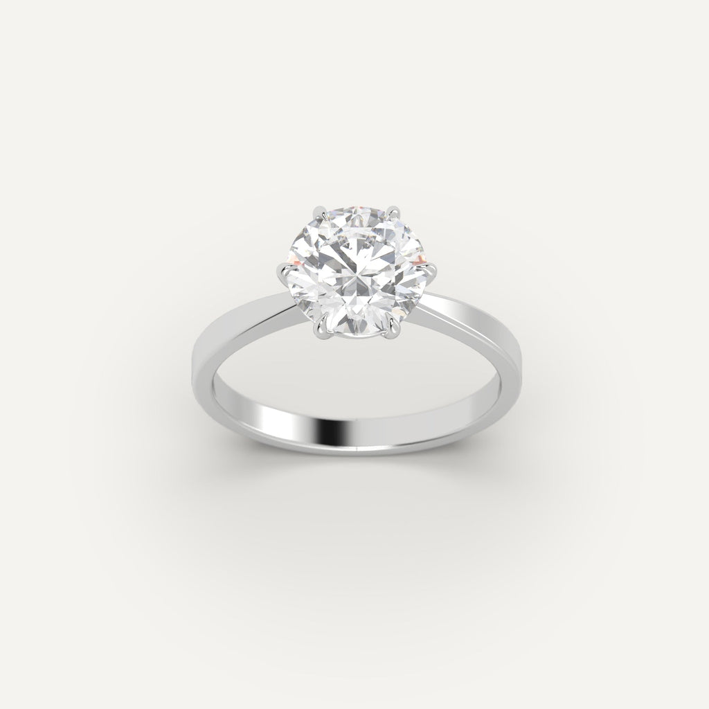 White Gold 2 Carat Engagement Ring On Woman's Hand