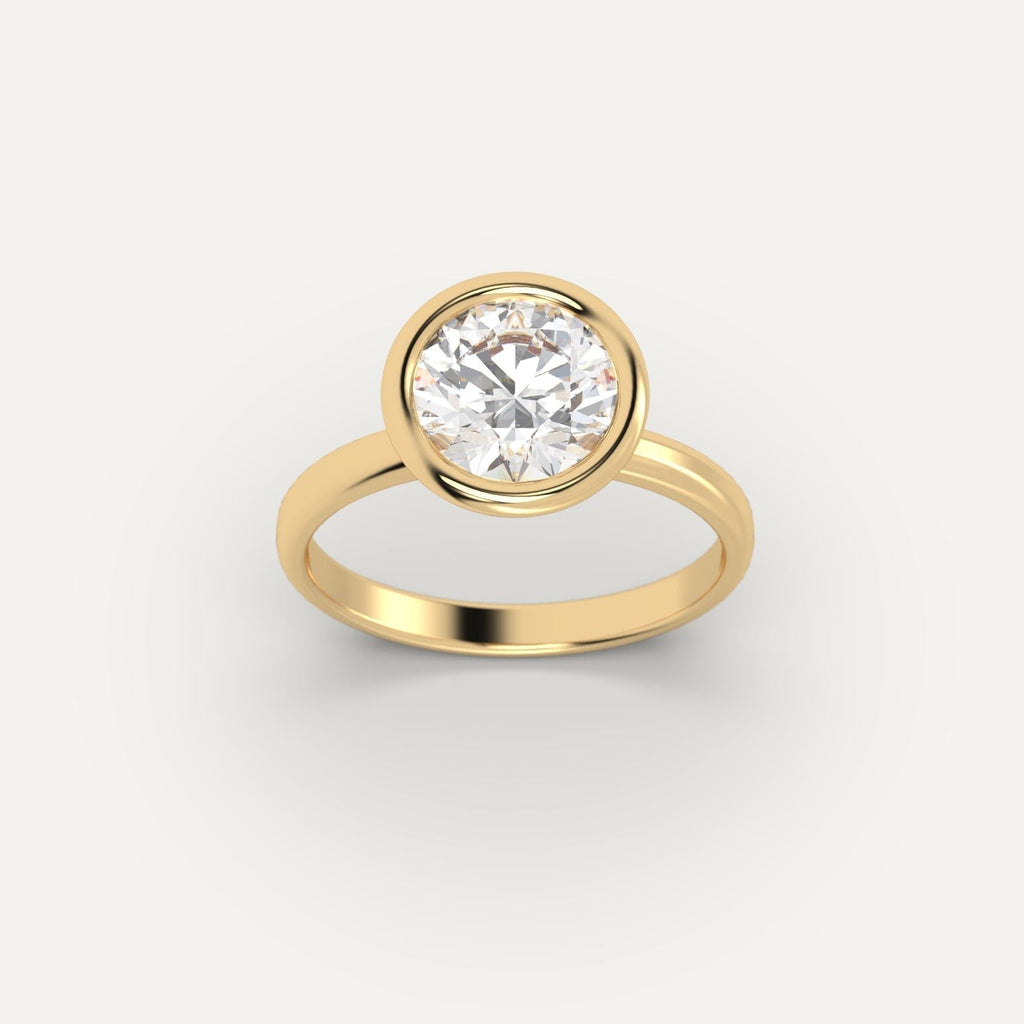 Yellow Gold 2 Carat Engagement Ring On Woman's Hand