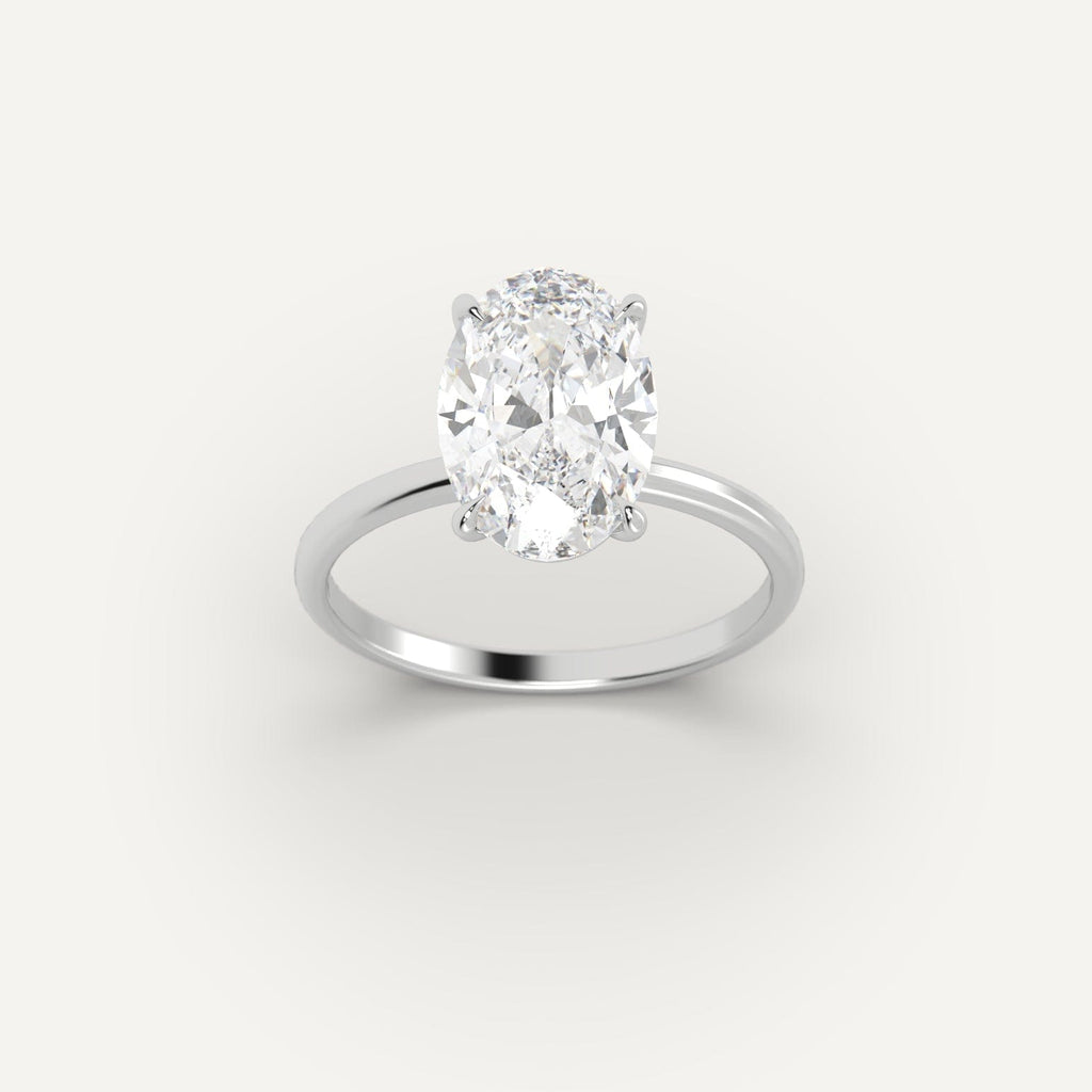 White Gold 3 Carat Engagement Ring On Woman's Hand