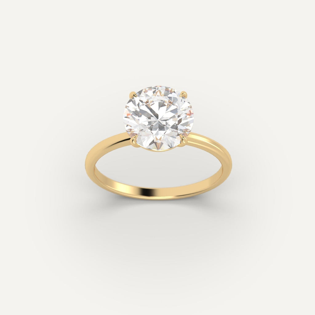 Yellow Gold 3 Carat Engagement Ring On Woman's Hand