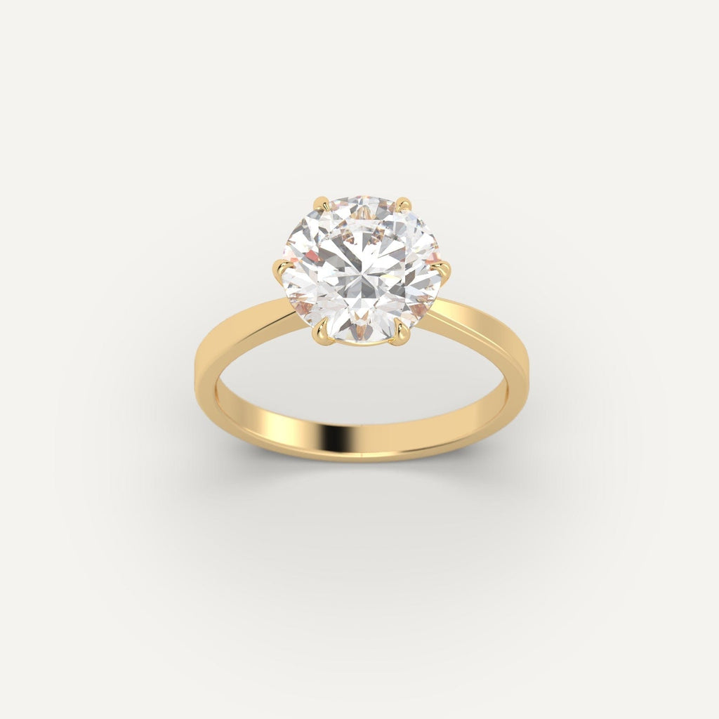 Yellow Gold 3 Carat Engagement Ring On Woman's Hand