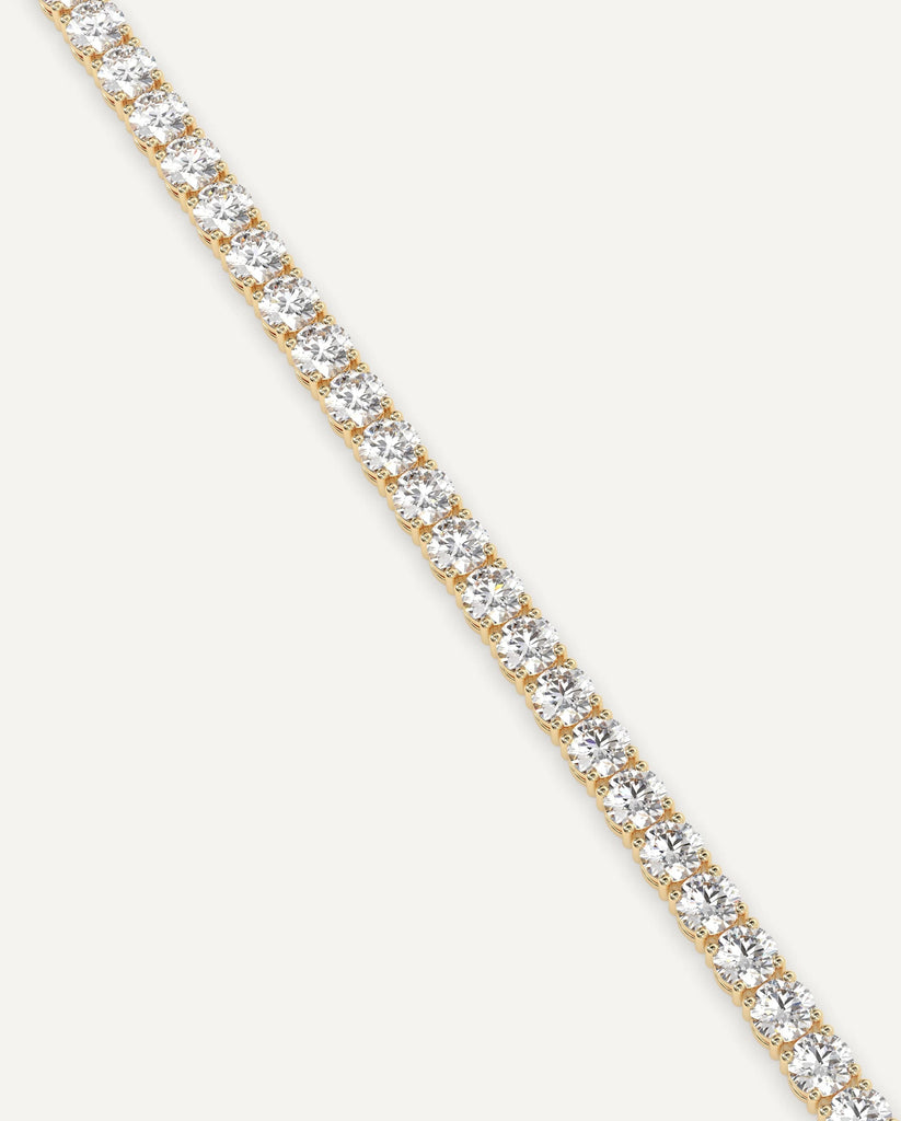 classic diamond tennis bracelet with round natural diamonds in yellow gold